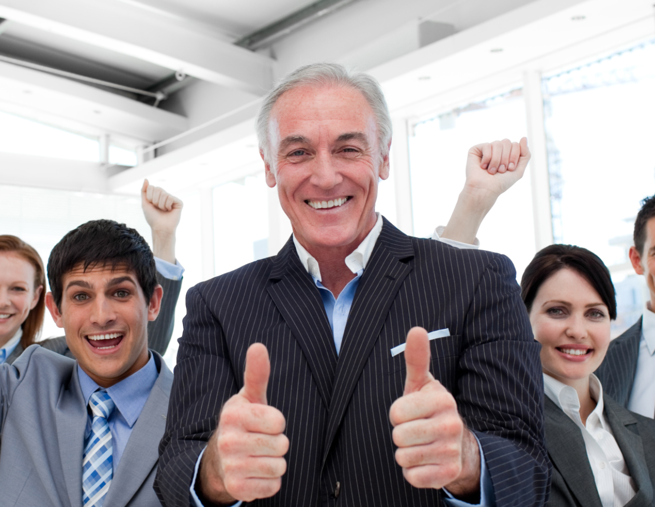 Collage of business people posing and working at the office
